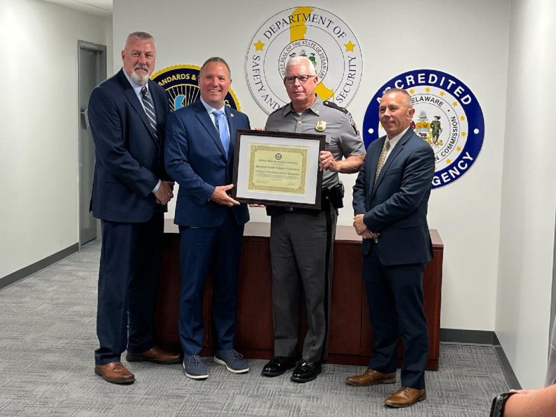 Gathered for the reaccreditation announcement are (l-r) Delaware Police Accreditation Commission Administrator John Feehan, Department of Safety and Homeland Security Secretary Joshua Bushweller, Division of Alcohol & Tobacco Enforcement Director John A. Yeomans, and Police Officer Standards and Training Commission Executive Director Sean E. Moriarty, EdD. SUBMITTED PHOTOS